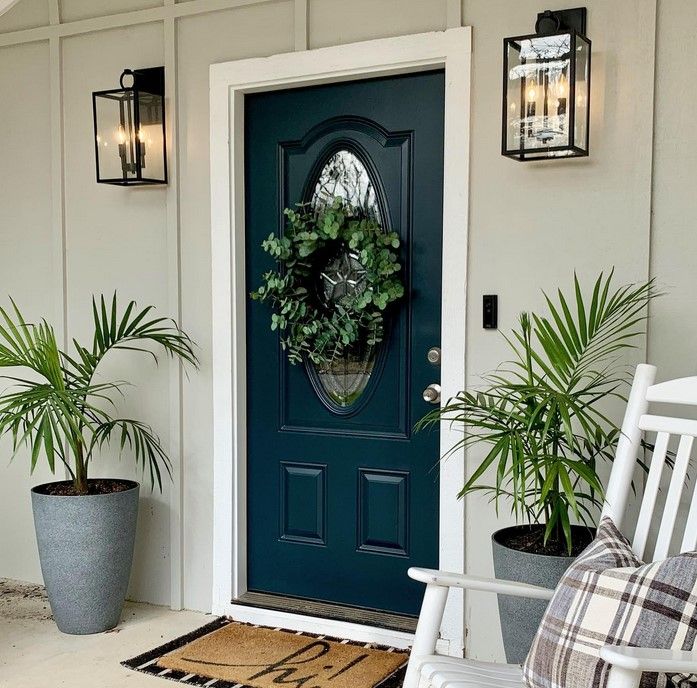 Sherwin Williams Dark Night on a front door and an accent wall in the bedroom.01