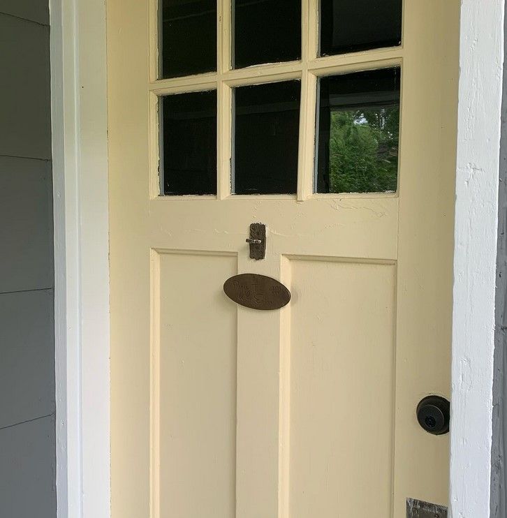 Sherwin Williams Friendly Yellow on a front door and the walls of a children’s bedroom.1