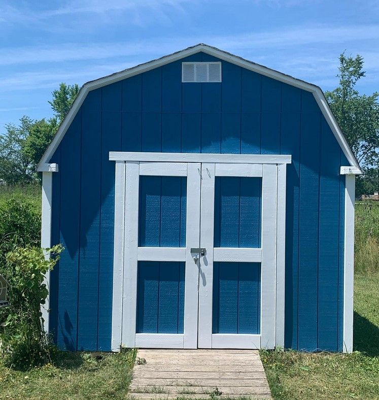 Sherwin Williams Georgian Bay on exterior walls and an accent wall.01