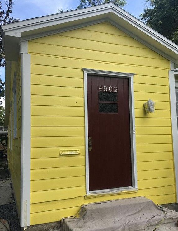 Sherwin Williams Lemon Twist displays a strong yellow tone in both interior and exterior spaces.