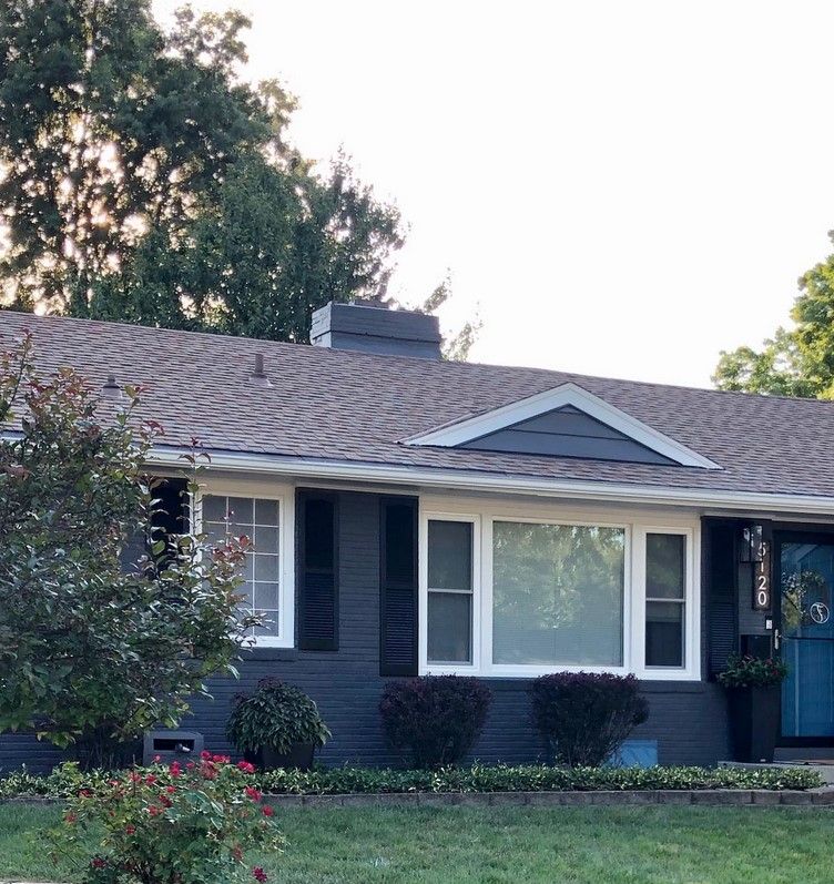 Sherwin Williams Santorini Blue on exterior walls and a front door.01