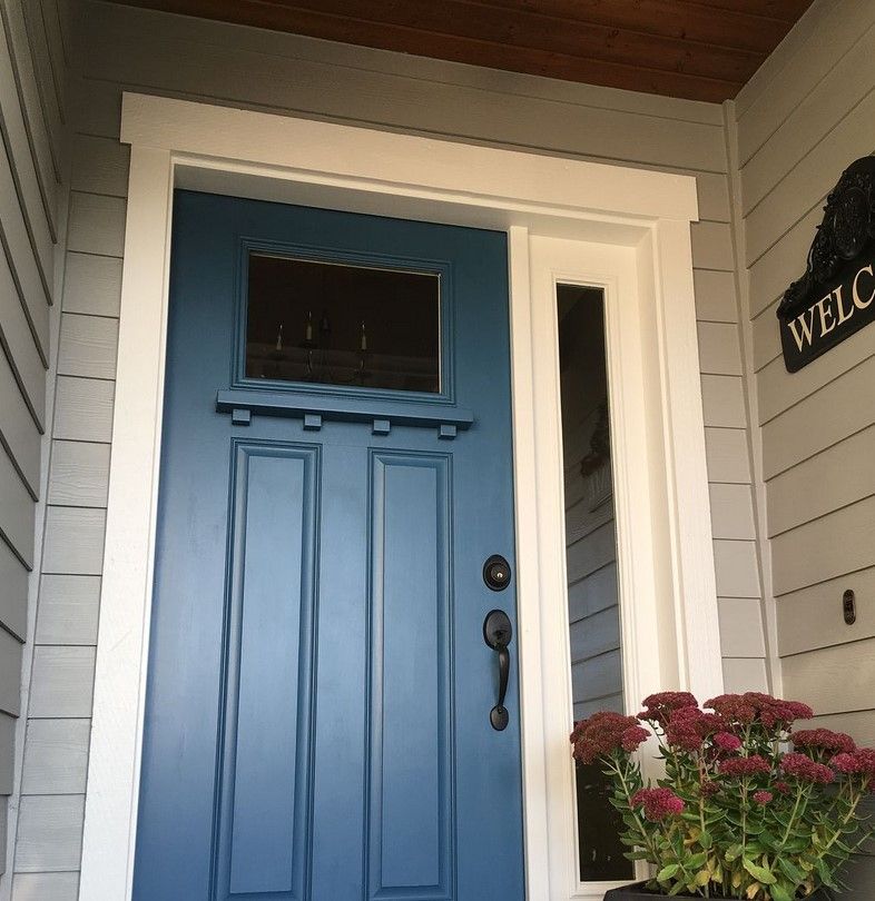 Sherwin Williams Santorini Blue on exterior walls and a front door.02