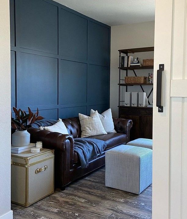 Sherwin Williams Sea Serpent on the accent walls contrasts well with the brighter neutrals.