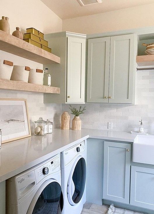 Sherwin Williams on the cabinets leaning into blue because of the light.