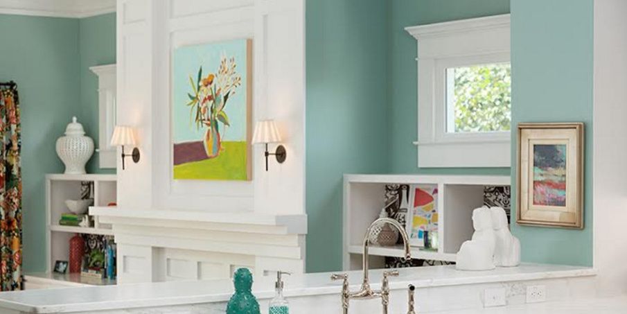 (A cool and calm Benjamin Moore Wythe Blue living room with bold white trims)