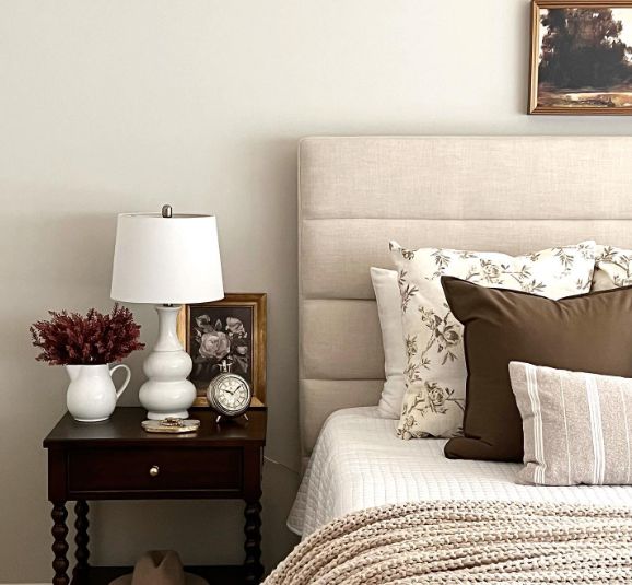 A cozy Sherwin Williams Agreeable Gray bedroom