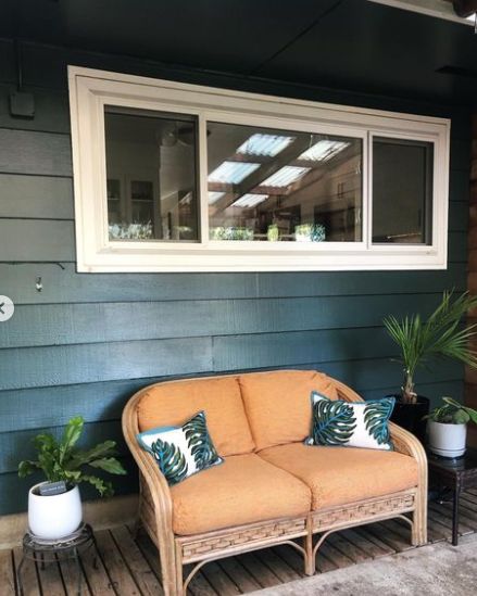 (Behr Underwater is right on character with the plants and pillows in this porch)