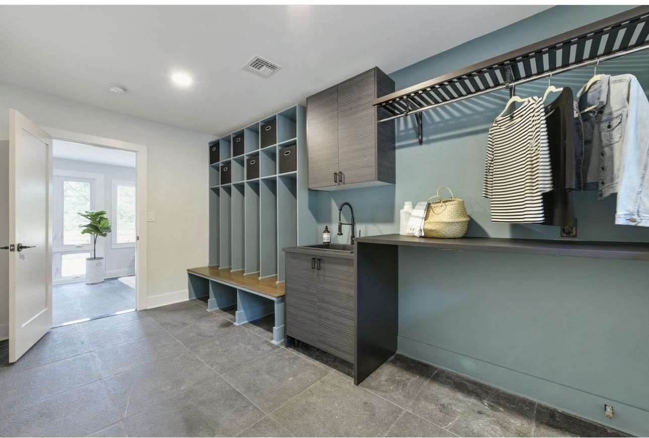 (Benjamin Moore Aegean Teal stands out in this closet)