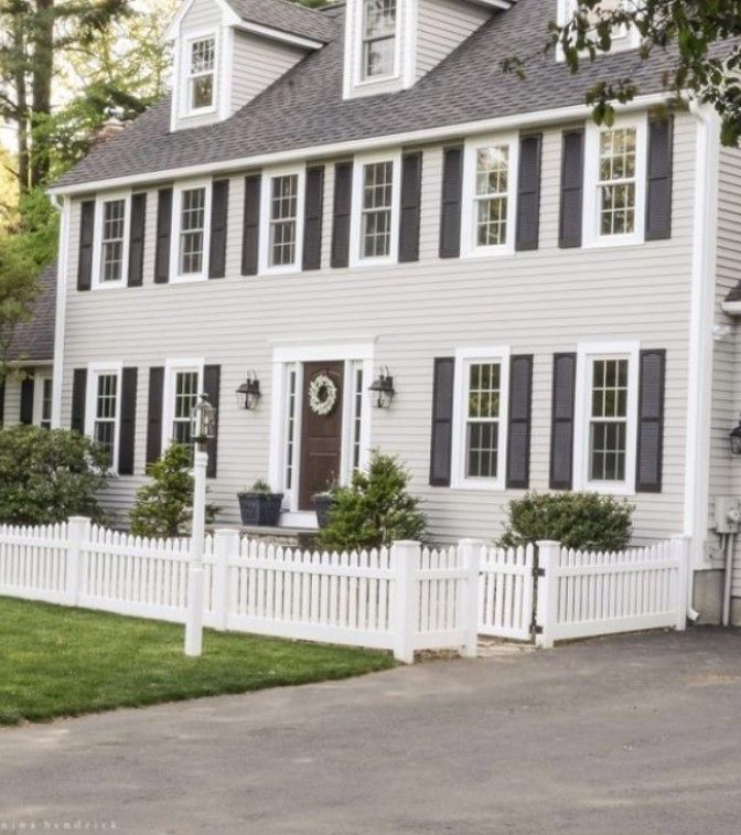 Benjamin Moore Onyx on the window shutters.