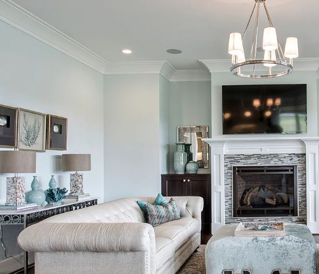 (Embrace the echoes of a chilly day out at sea in this Sherwin Williams Watery Living Room)