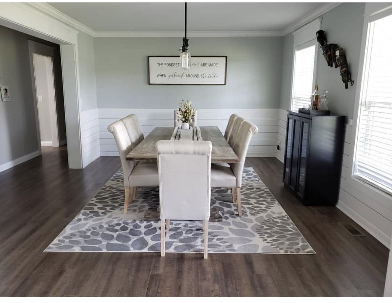 (No more boring dining rooms with Sherwin Williams Silver Strand accent walls)