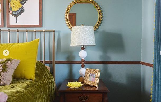 (Sherwin Williams Drizzle reminds us of a fun day at sea with the yellow and gold details)