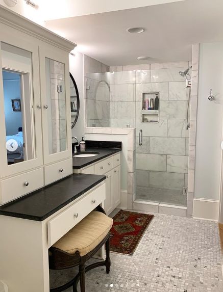 (Sherwin Williams Topsail is a bit shy, but present in this bathroom)